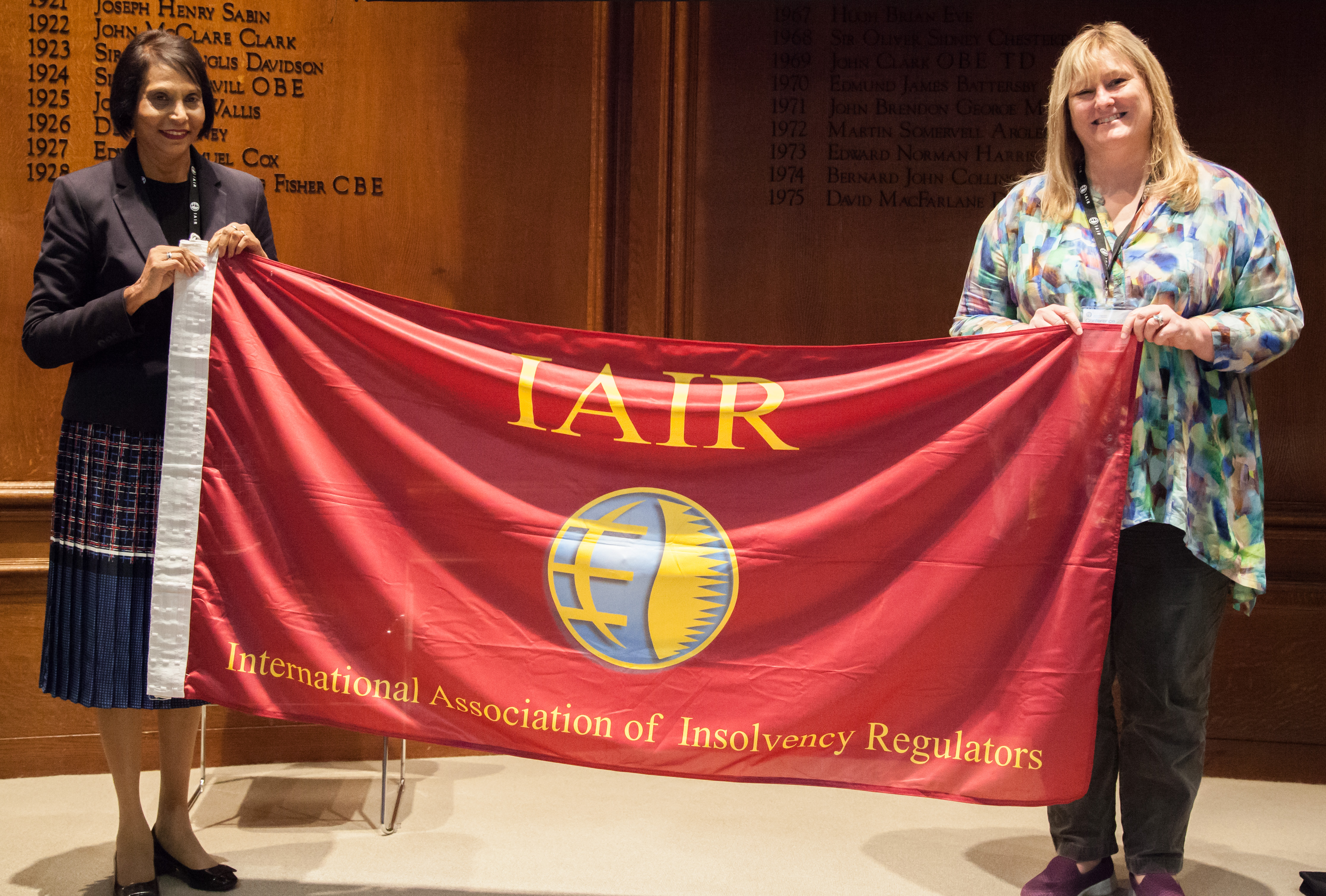 Handing over the flag to Mauritius